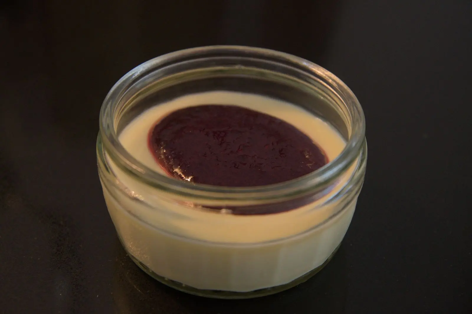 Lemon posset with blueberry and pine sauce